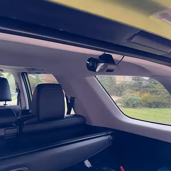 Rear dash camera mounted near the headliner