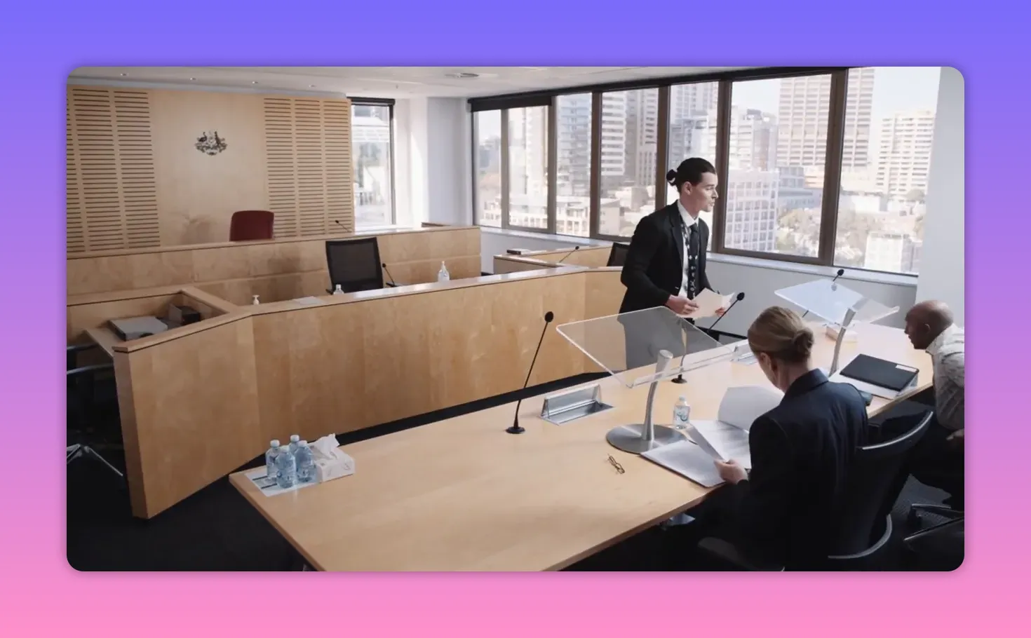 Clear view of the hearing bench and bar table with microphones and papers
