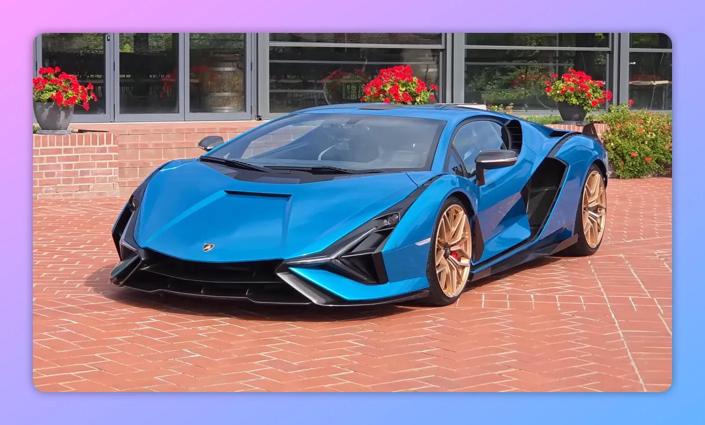 Lamborghini Sian blu vista frontale tre quarti parcheggiata su pavimentazione rossa