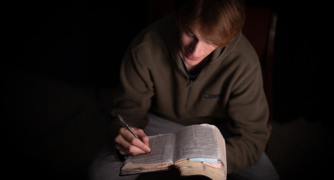 thoughtful person praying in quiet room