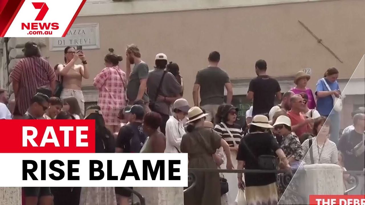 video thumbnail for 'Interest rate rise sparks political blame game | 7NEWS'