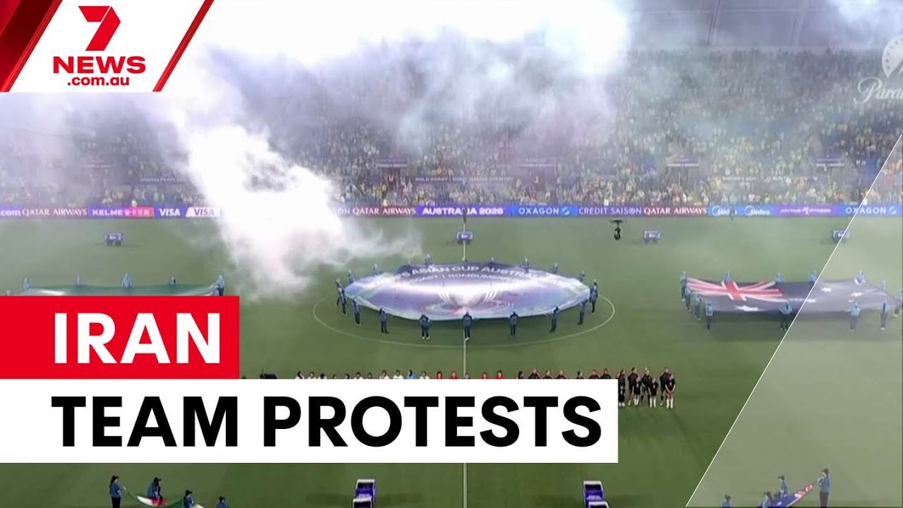 video thumbnail for 'Iranian women's team sings anthem amid protests | 7NEWS'