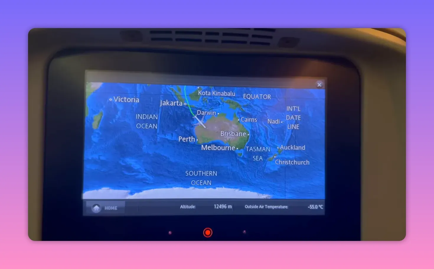 seatback in-flight map display showing flight path to Melbourne with altitude and outside air temperature