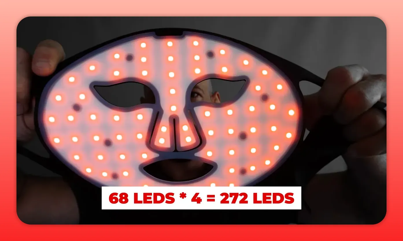 Close-up of the Inia Glow mask with red LEDs illuminated, showing the LED layout and spacing across the mask.