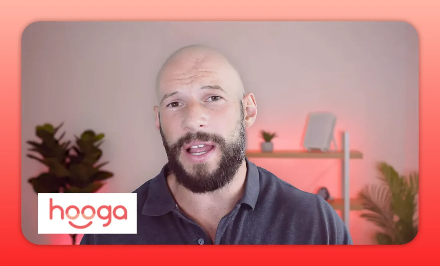 Presenter with a Hooga logo overlay and red-lit shelving behind, illustrating the Hooga Ultra discussion