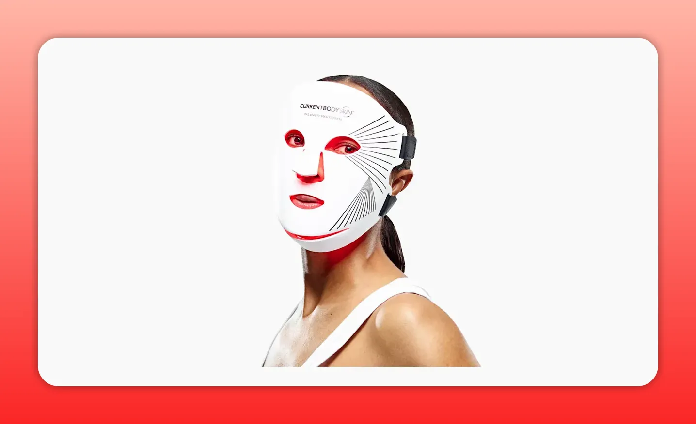 Commercial product shot of the CurrentBody Skin LED red light therapy face mask worn by a model on a white background
