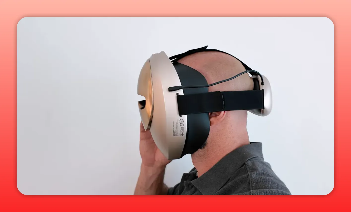 Side profile of a person wearing a red light therapy mask showing head straps and rear module for fit assessment