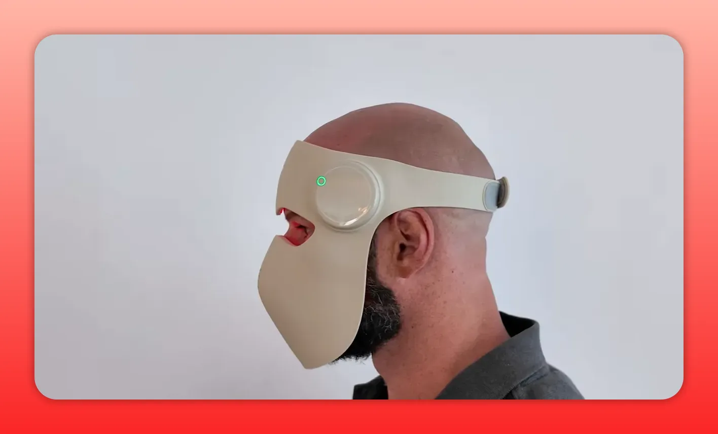 Side profile of a person wearing a beige headband-style red light mask with strap and side control