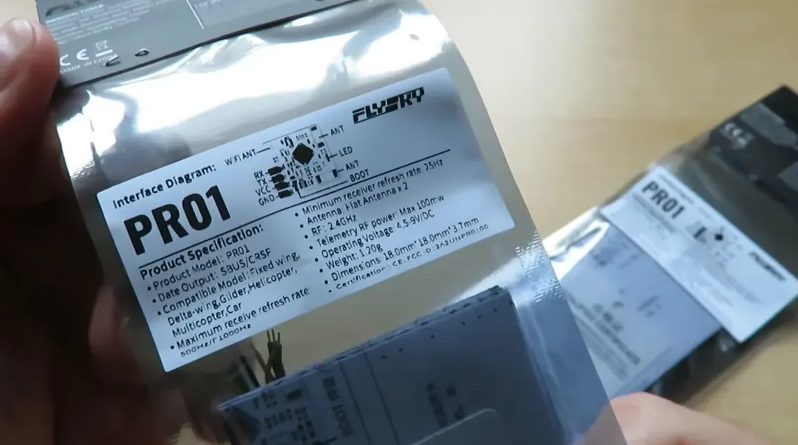 PR01 receiver packaging label showing product specifications and interface diagram