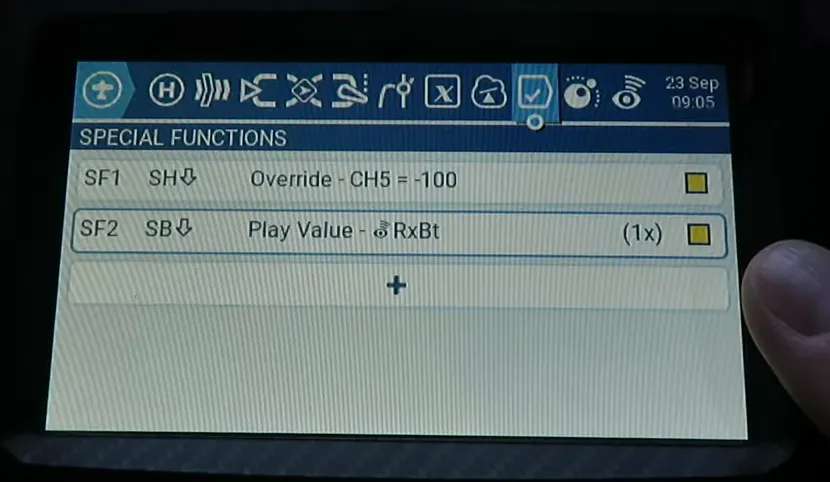 EdgeTX Special Functions screen showing 'Play Value - RxBt' with a finger selecting the option