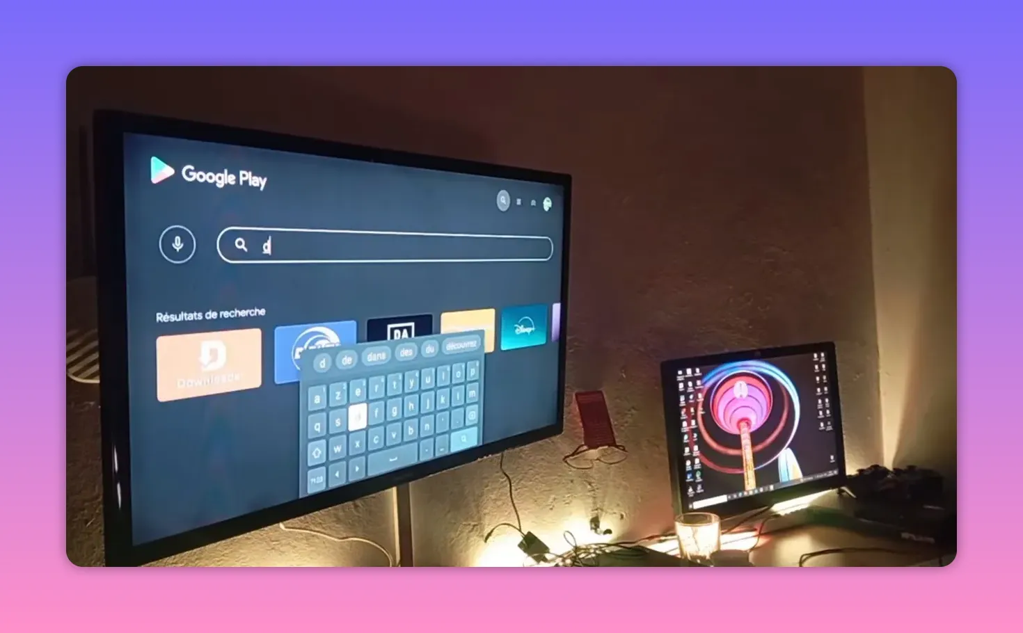 Google Play search results page with Downloader app result shown on a TV