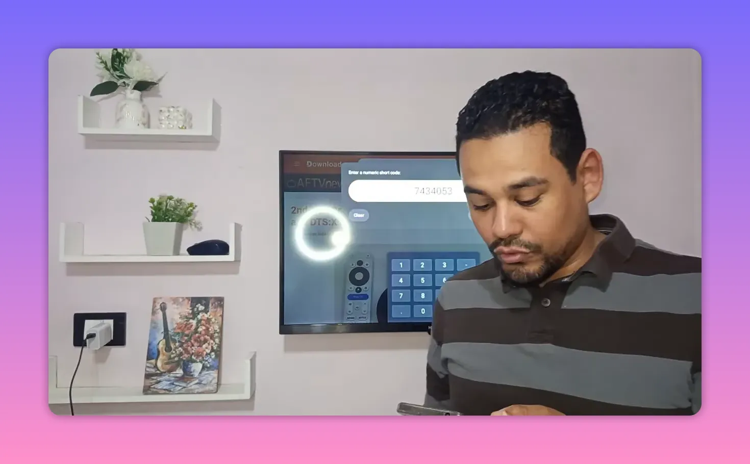 Entering Al Mostadira download code in Downloader on Android TV screen