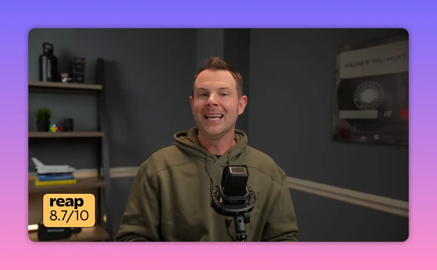 Presenter in studio with a Reap 8.7/10 rating badge visible in the corner