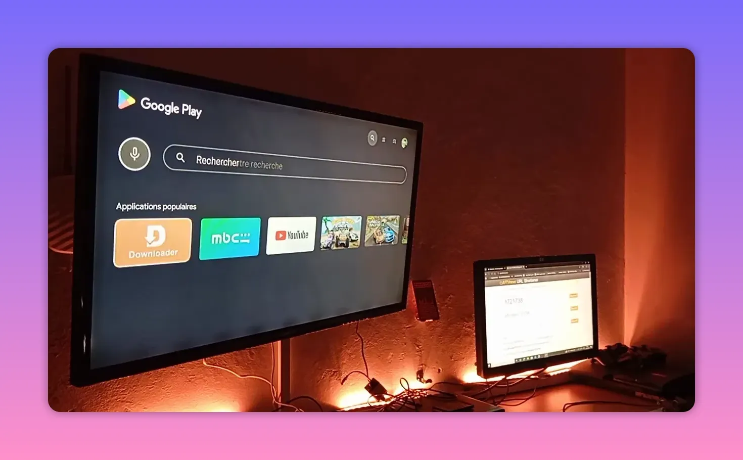 Android TV home screen showing the Downloader app icon