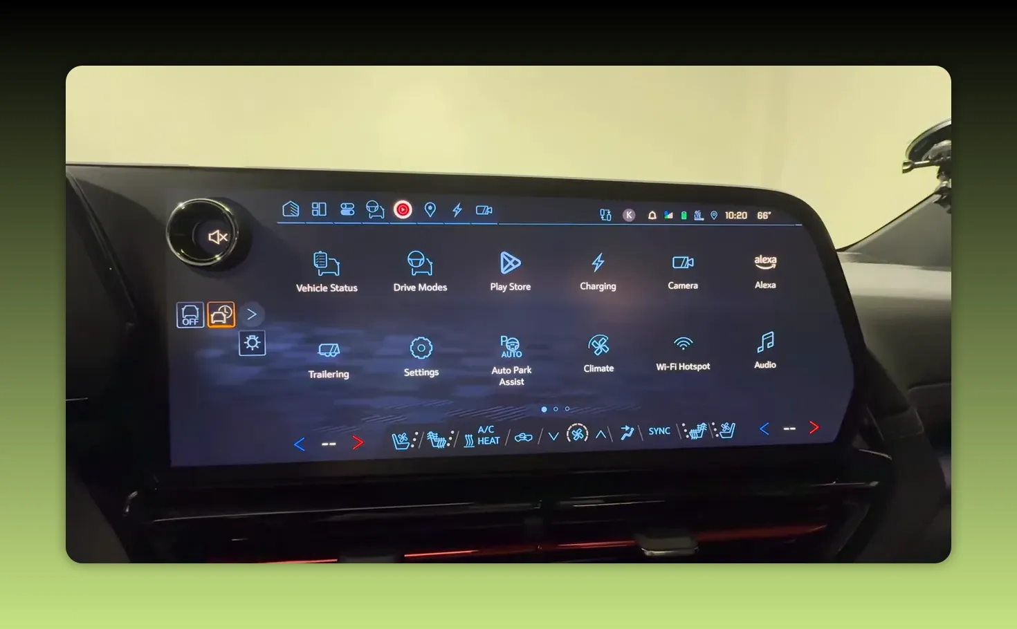 Infotainment apps menu with a clear Play Store icon centered alongside Vehicle Status, Drive Modes, Charging, Camera and Alexa icons