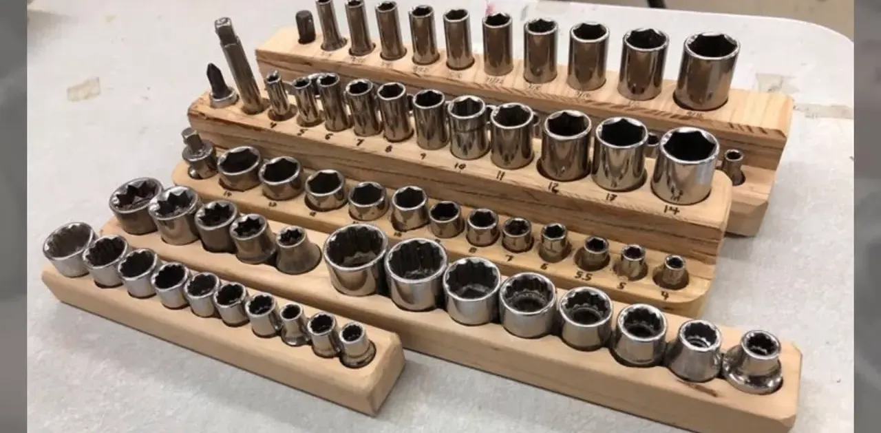 wooden stepped socket organizers holding metal sockets arranged by size