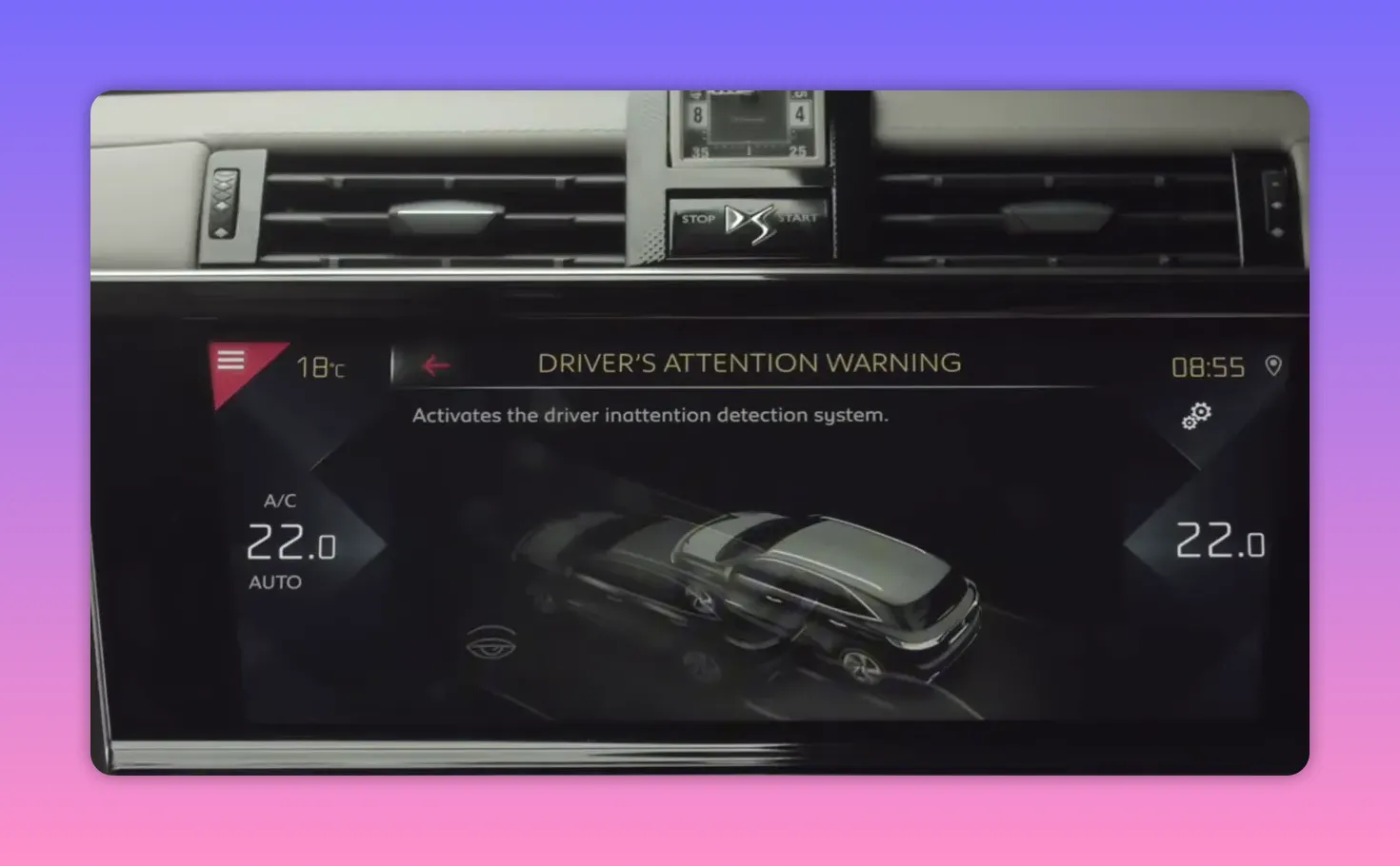 Infotainment screen reading 'DRIVER'S ATTENTION WARNING' with an activation description and car graphic