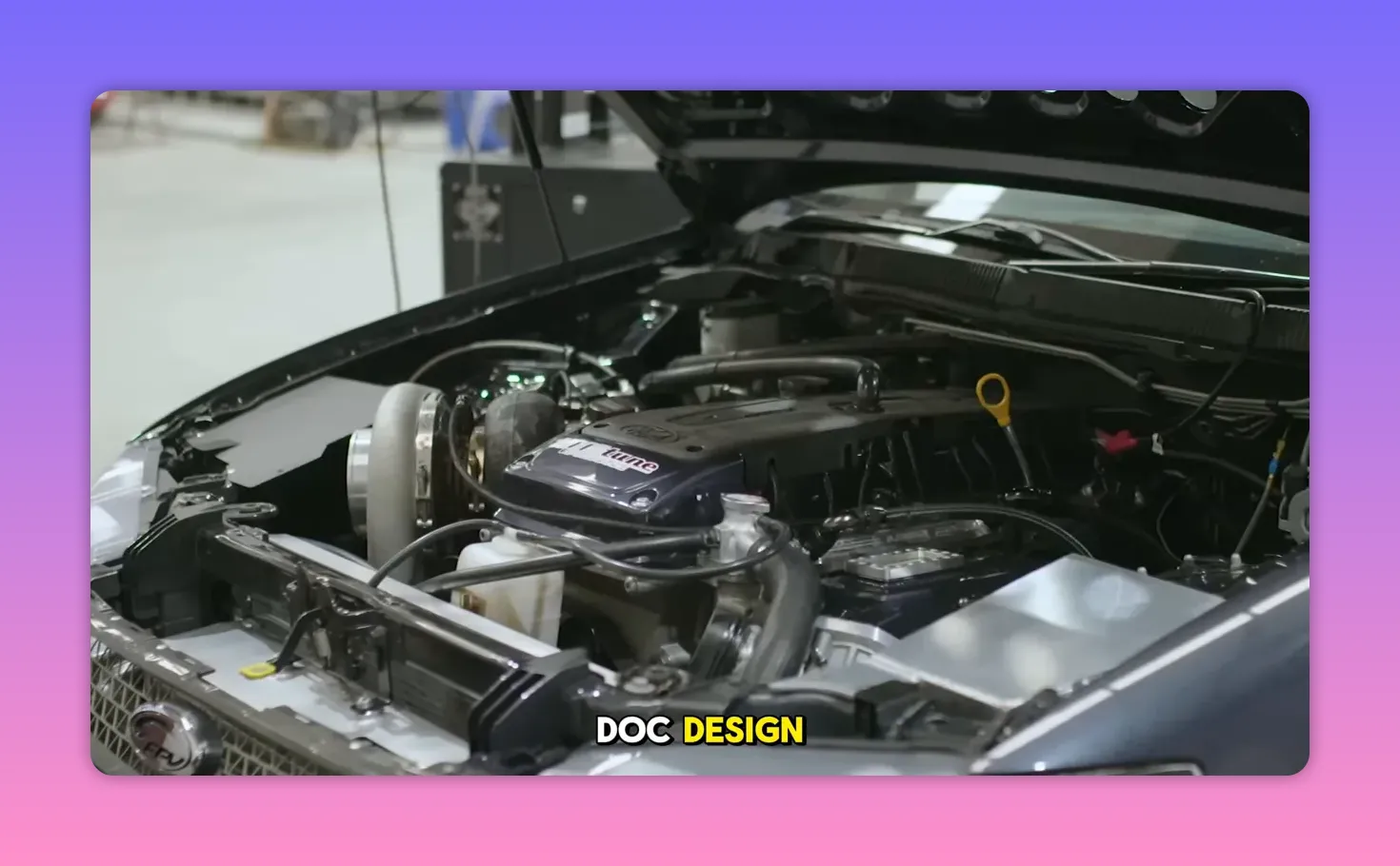 Clean engine bay showing a turbocharger, intake piping and the inline-six valve cover.