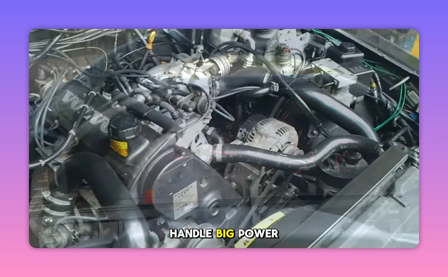 Wide shot of engine bay showing turbocharger, intake piping and alternator