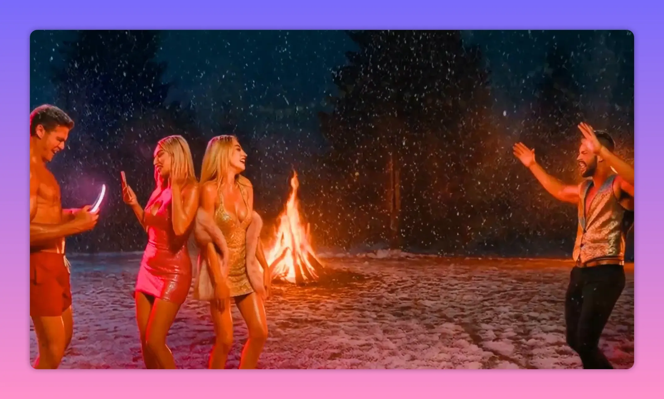 Wide shot of four glamorous people in sparkly outfits around a bonfire on a snowy ground, showing contrast between glam and outdoor mess.