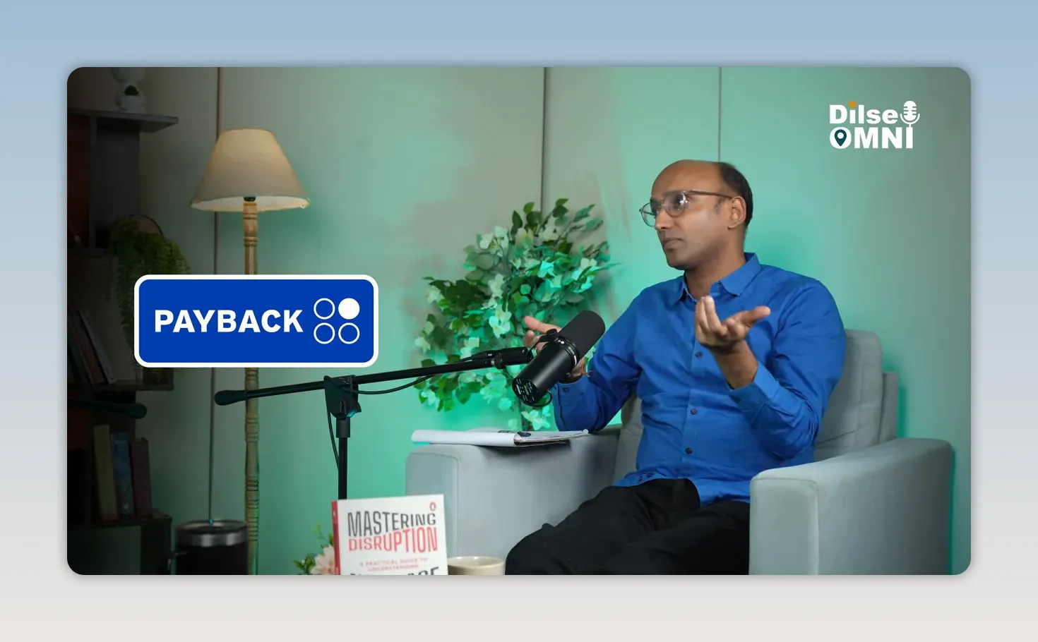 Saurabh Agrawal speaking in a studio with Payback logo graphic on screen