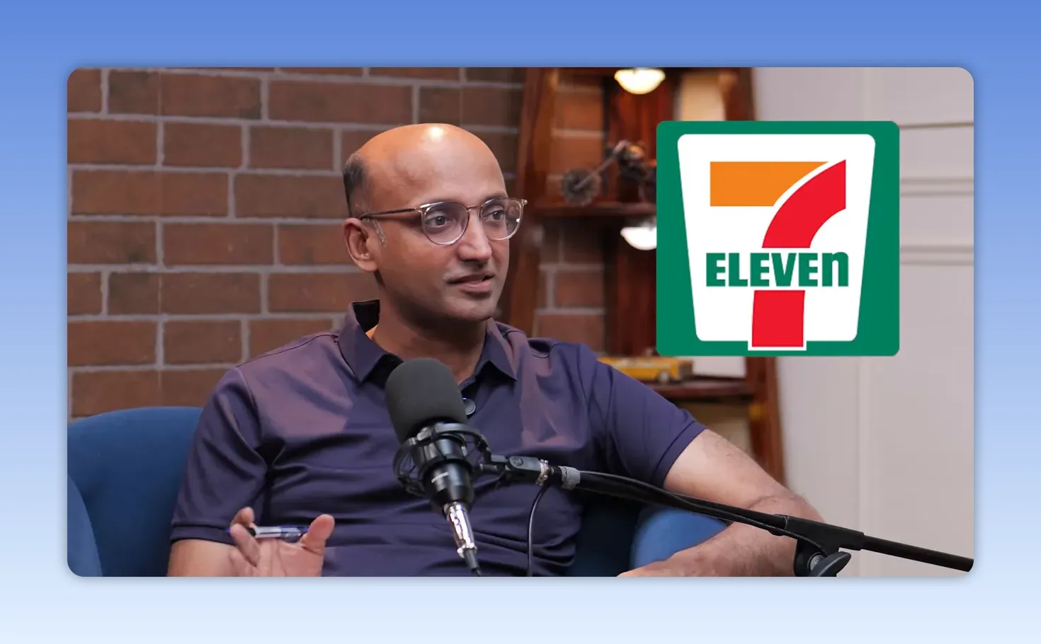 Saurabh speaking with a 7-Eleven logo graphic displayed on screen