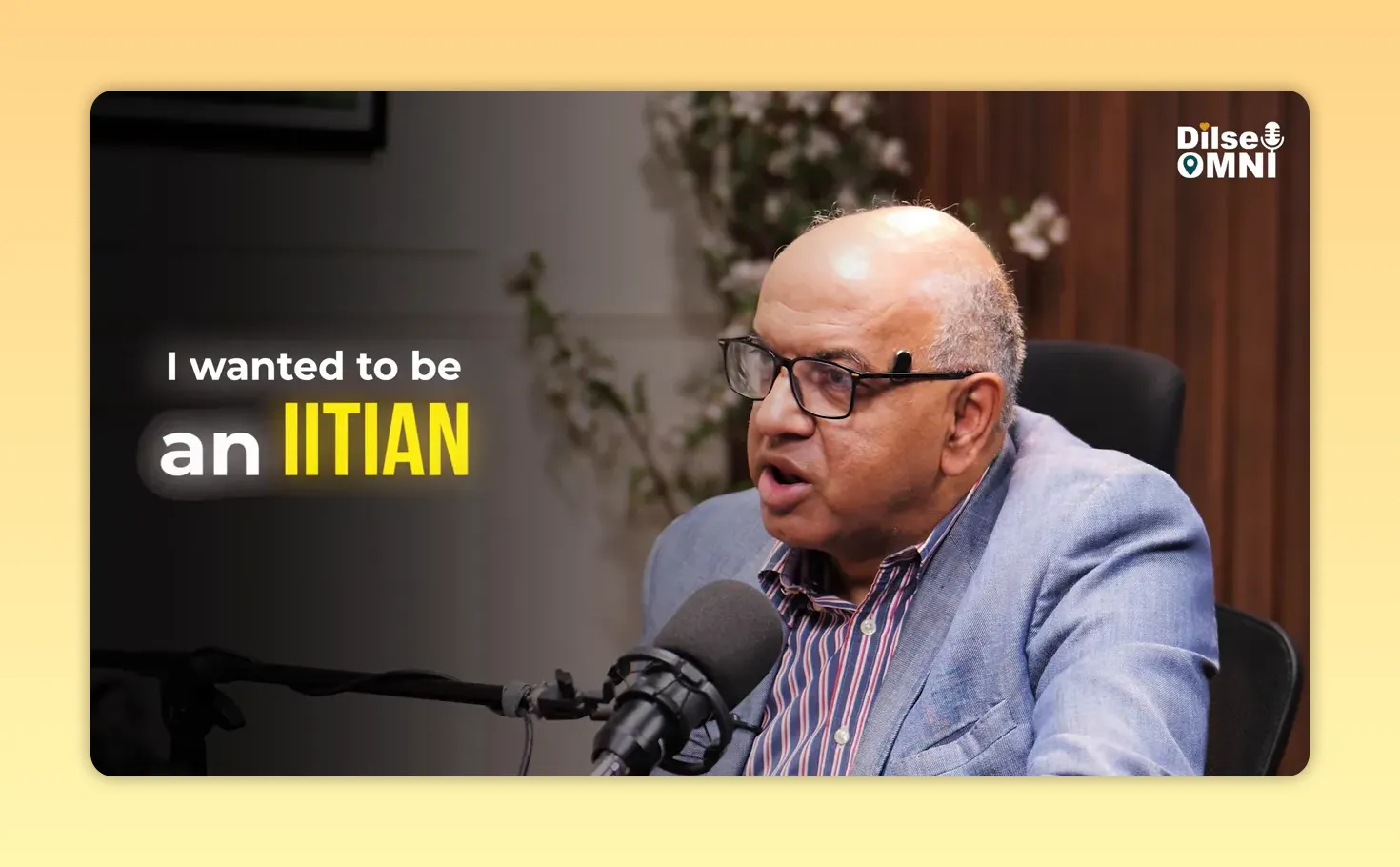 On screen text says I wanted to be an IITian a part of elite tribe beside Sanjeev speaking into a microphone