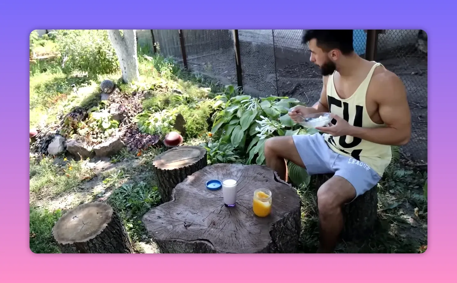 Athlete eating a bowl of cottage cheese outdoors beside a glass of milk and a jar of juice on a tree‑stump table