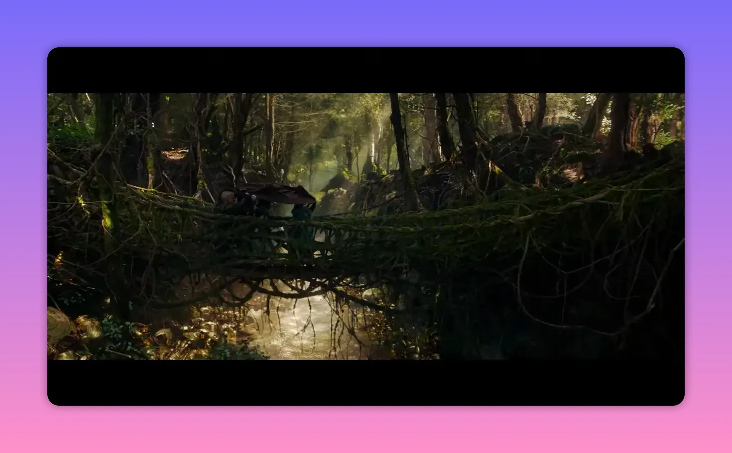 Moss-covered rope bridge spanning a ravine with characters crossing it