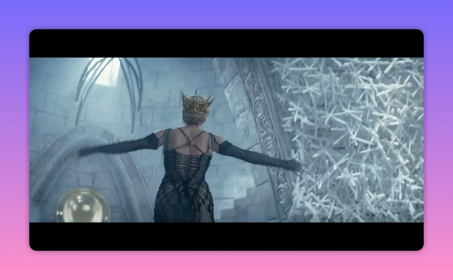 Rear view of the queen with arms extended facing a dense sculptural wall of icy spikes in a stone sanctuary, showing silhouette and scale