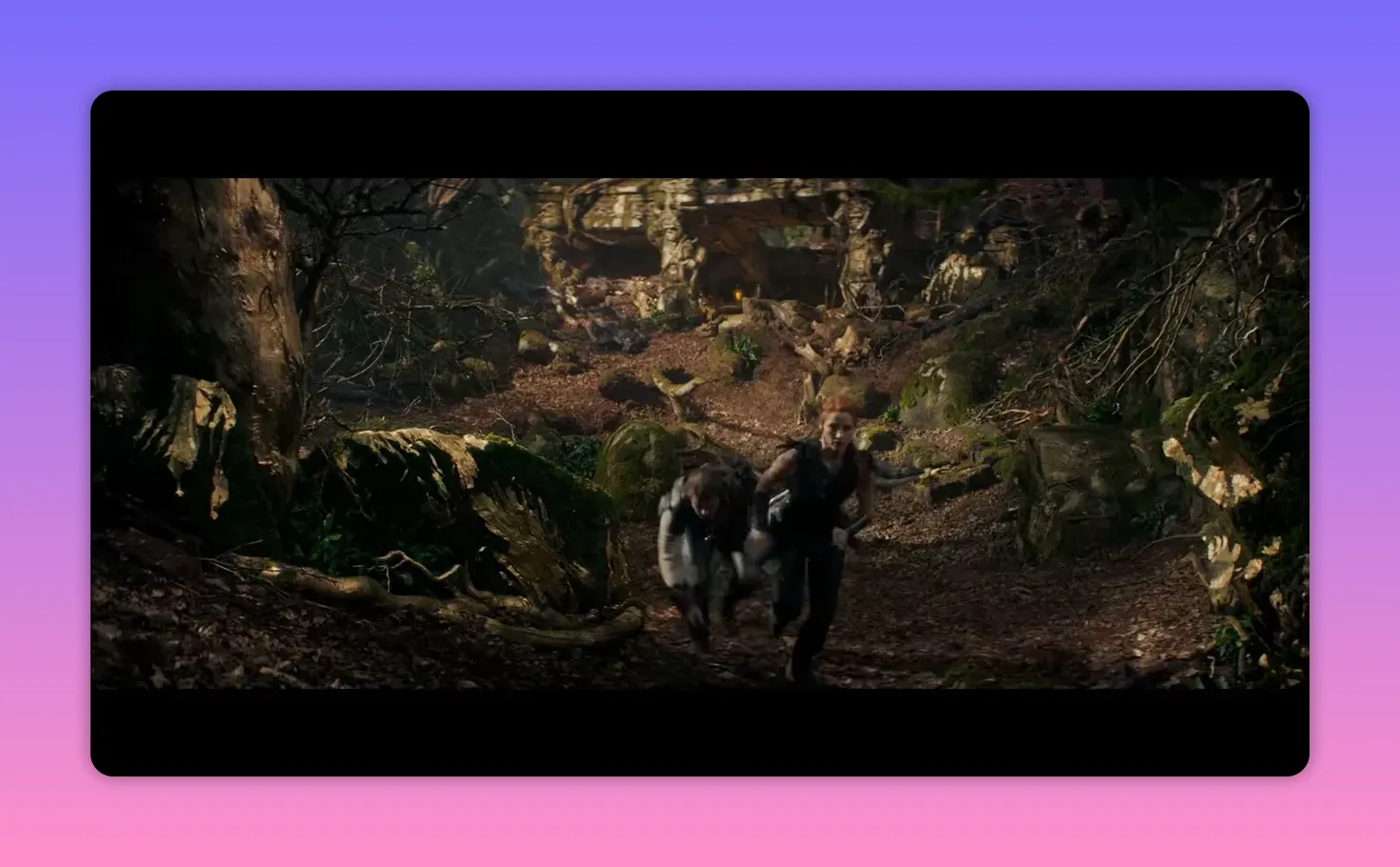 Wide shot of two characters running up a leaf-strewn forest path with twisted roots and mossy rocks, sunlit clearing beyond