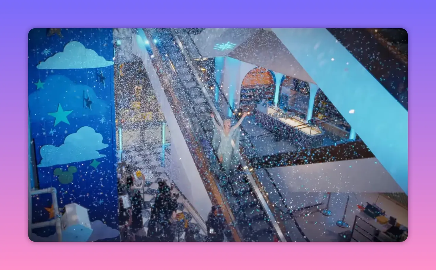 High-angle view of a performer on an escalator amid falling artificial snow with shoppers and store displays visible below.