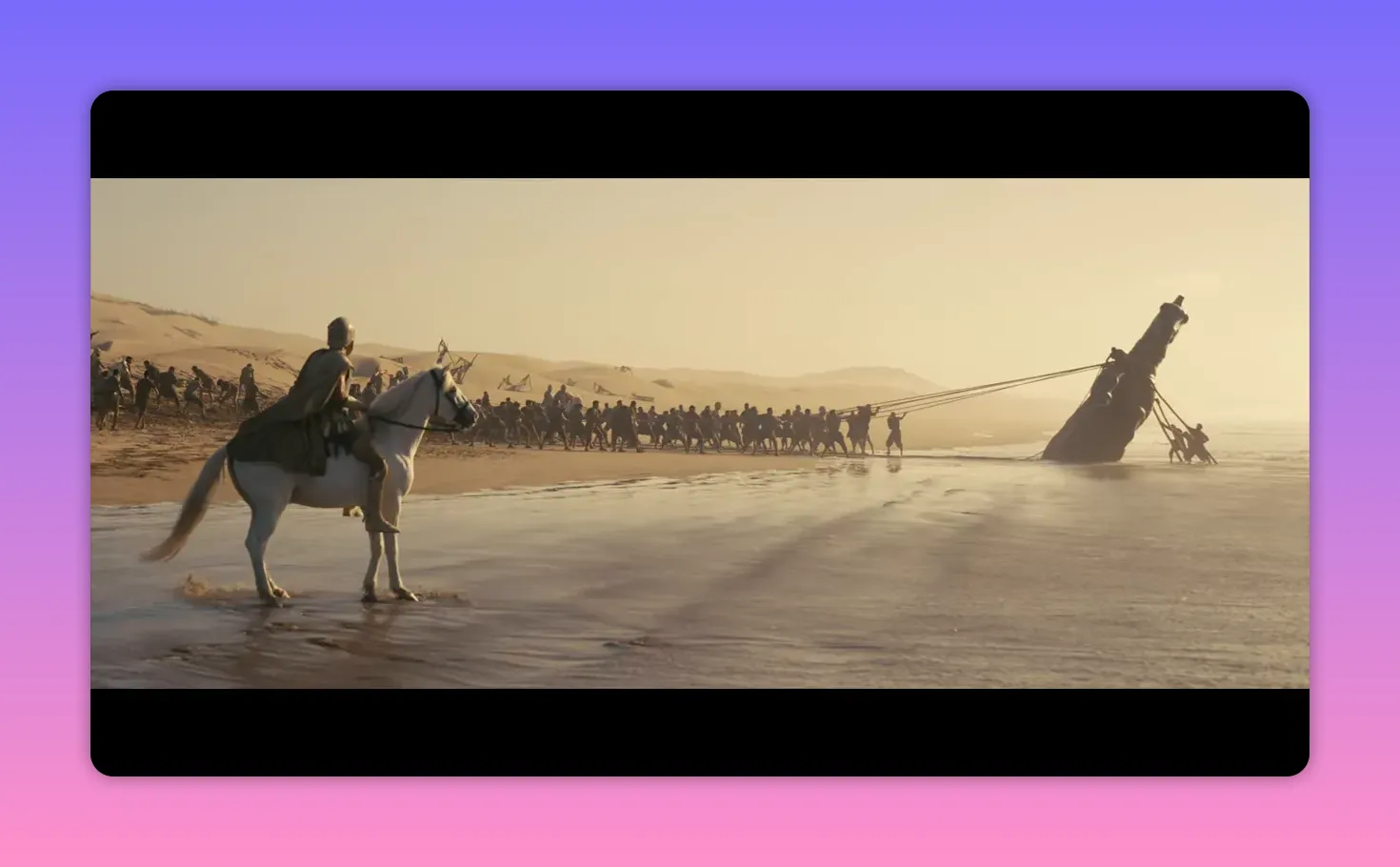 A mounted rider in the foreground watches a group hauling a beached ship along the shoreline at low tide