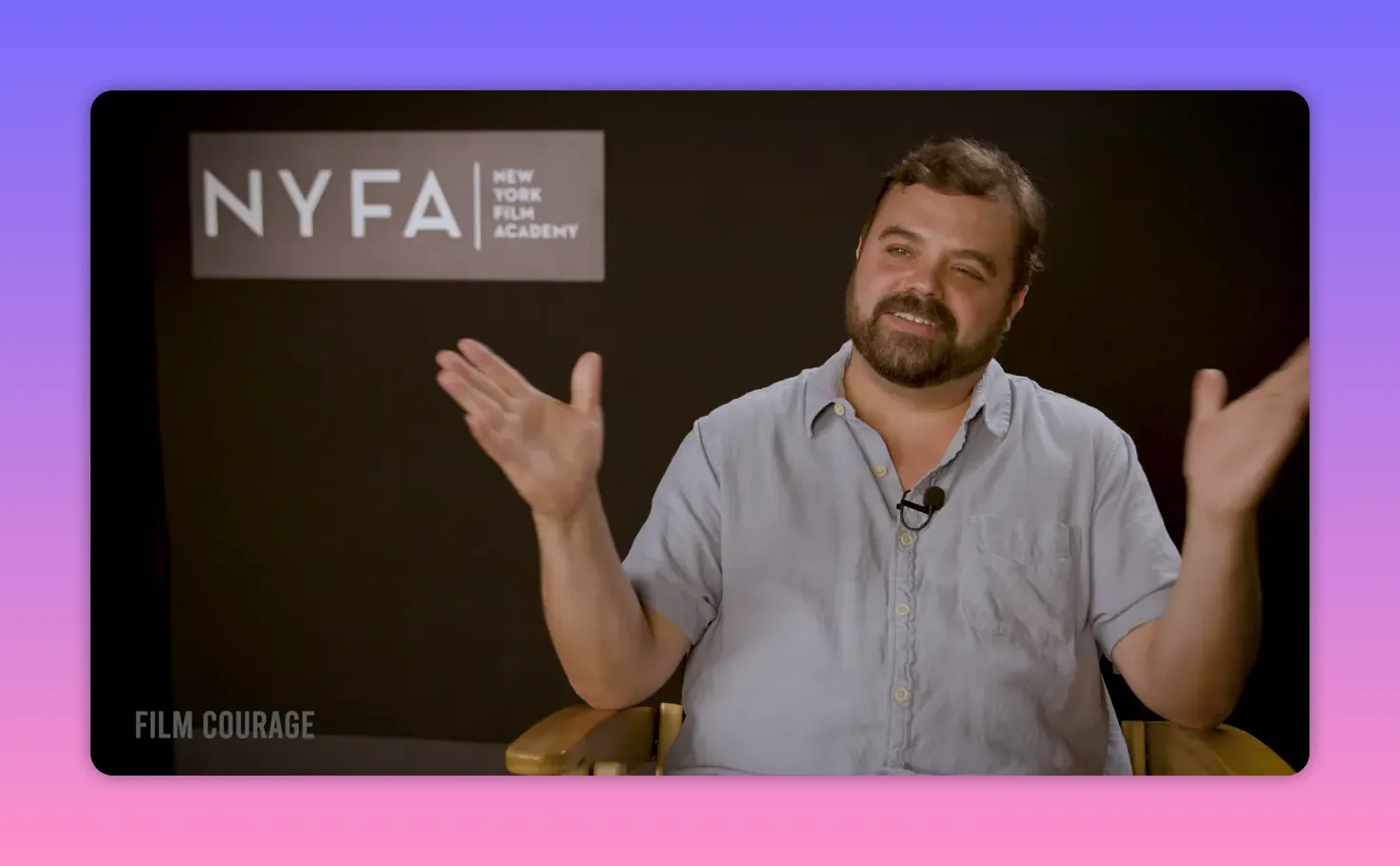 Interview subject smiling and gesturing broadly while speaking, NYFA backdrop visible.