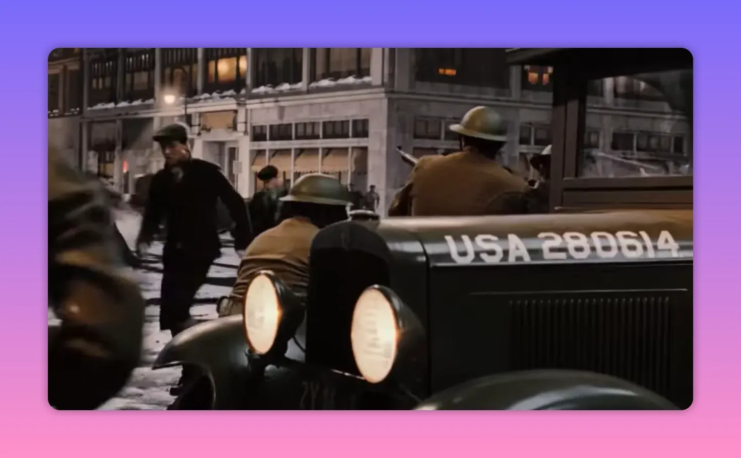 Military truck marked 'USA 280614' with helmeted soldiers on a snowy city street at night