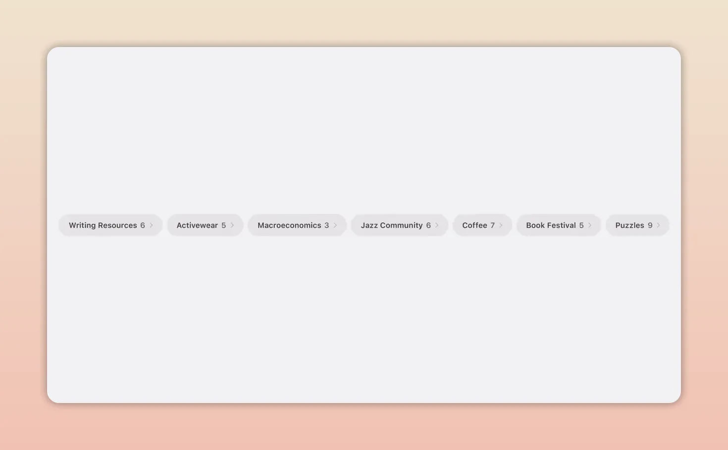 MacBook screen showing Safari tabs organized into groups or topics with colorful webpage previews