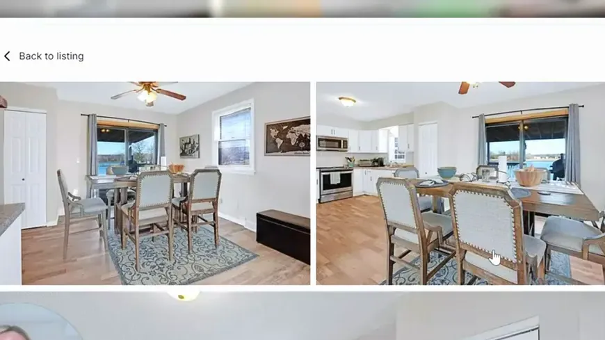 White remodeled kitchen with wood flooring and stainless appliances