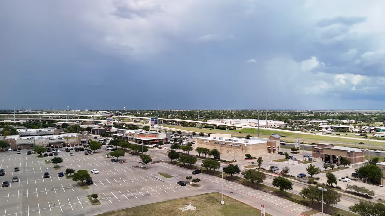 Aerial view of tech company parking space near The Grove At Blackhawk in Pflugerville TC