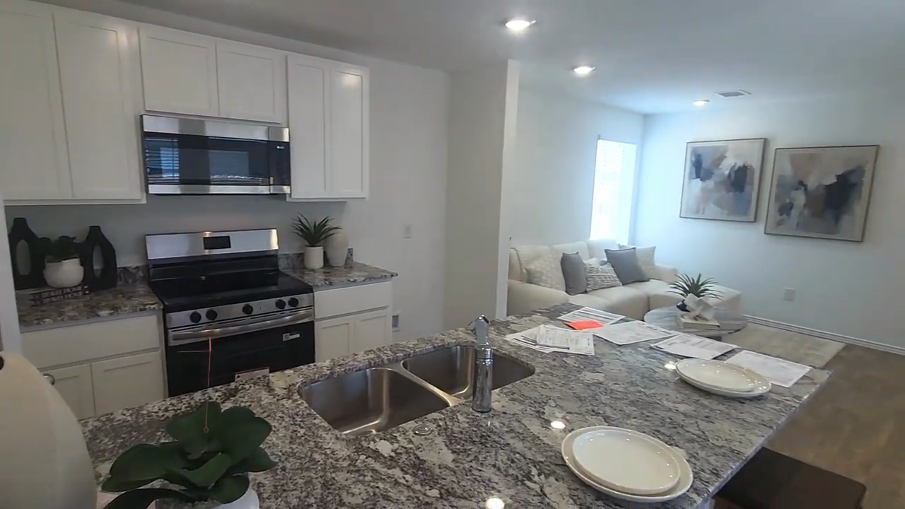 Kitchen island and living room overview