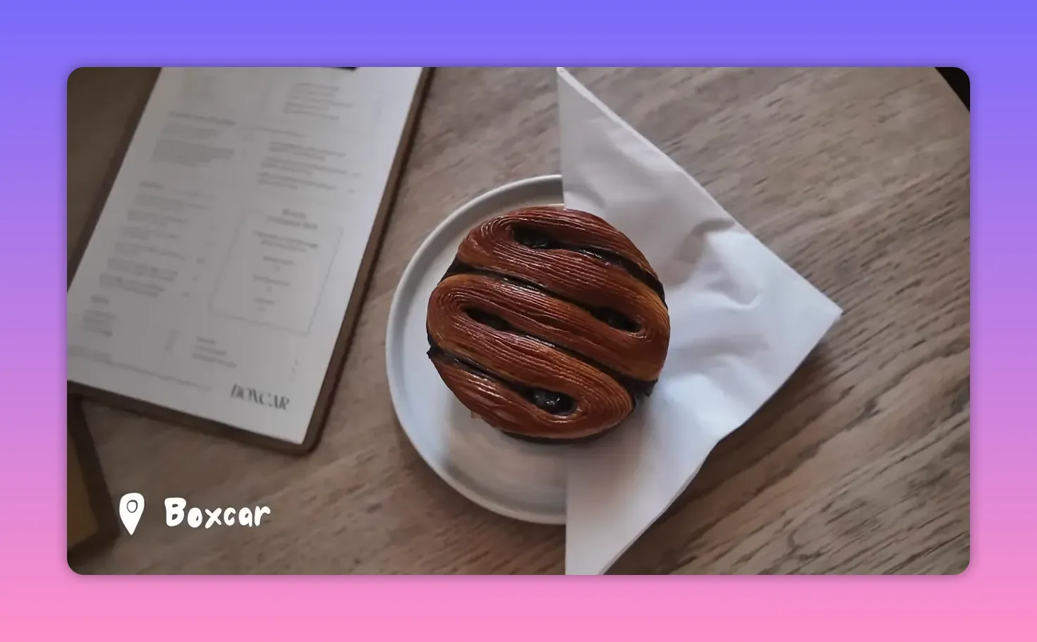 Close-up of Boxcar signature circle croissant pastry on a plate