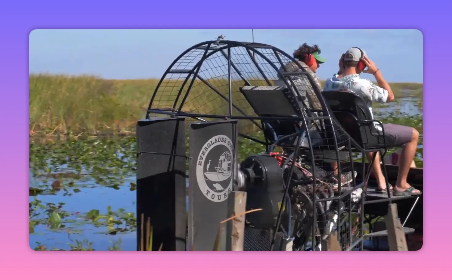 Everglades airboat tour with passengers sightseeing through wetlands