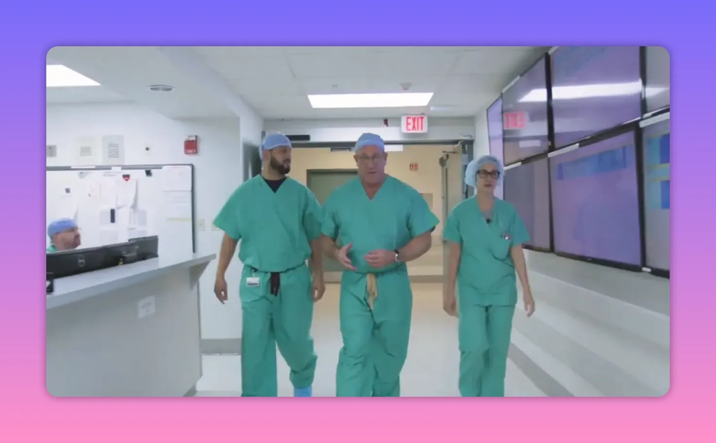 Medical professionals walking through a hospital corridor together