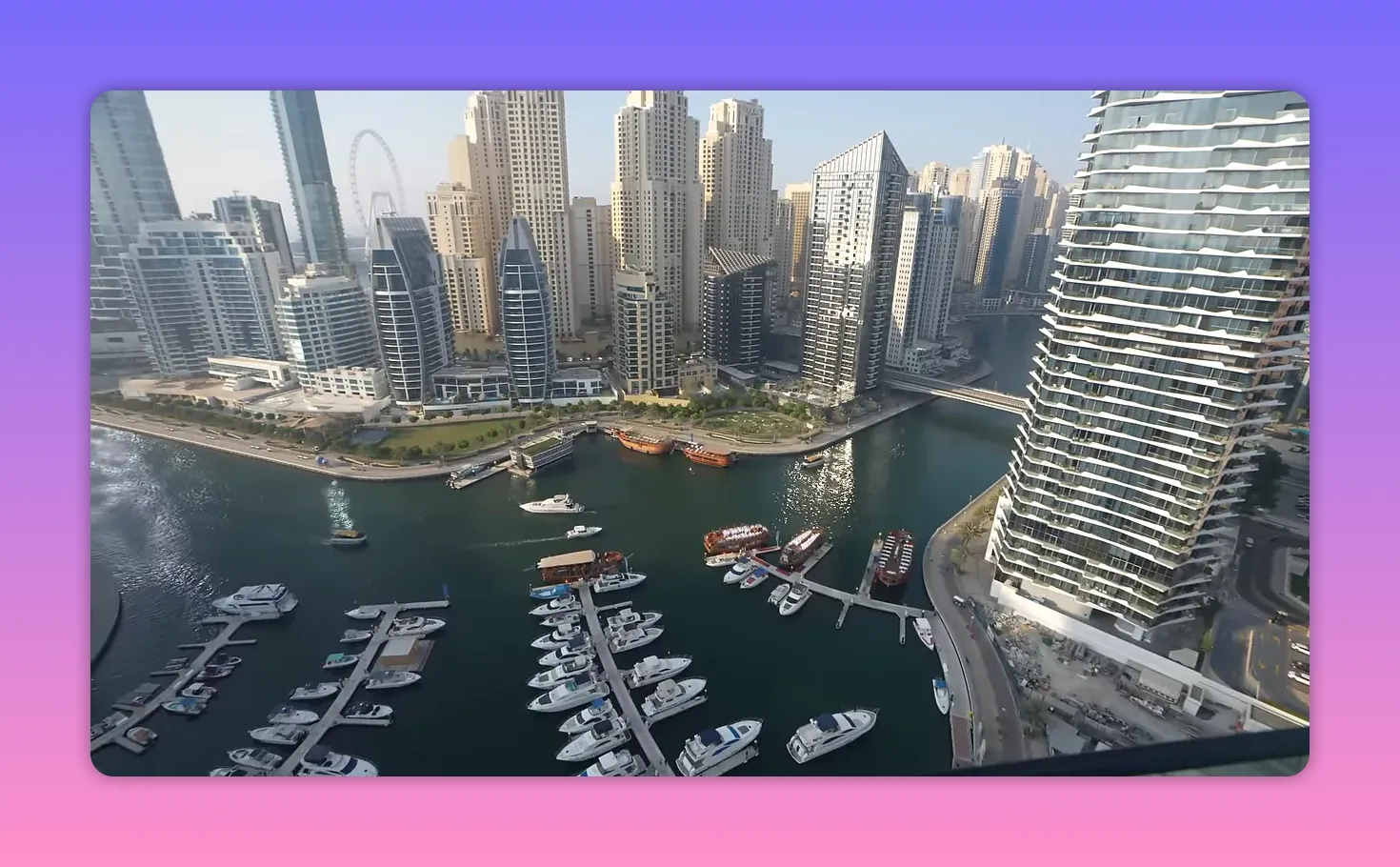 Dubai Marina waterfront with boats and high-rise buildings