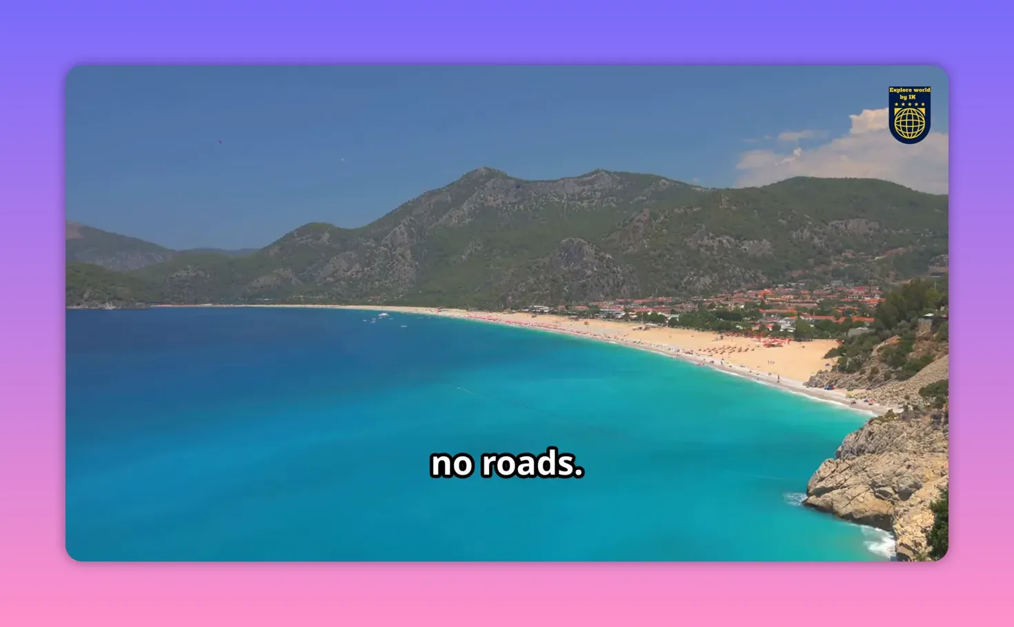 Aerial view of Butterfly Valley's bright turquoise bay, sandy beach and forested hills with minimal on-screen text.