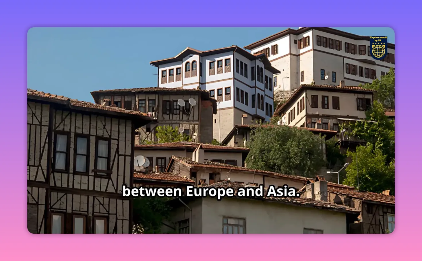Detailed view of Safranbolu Ottoman houses with timber frames, red tile roofs and blue sky, minimal on-screen text