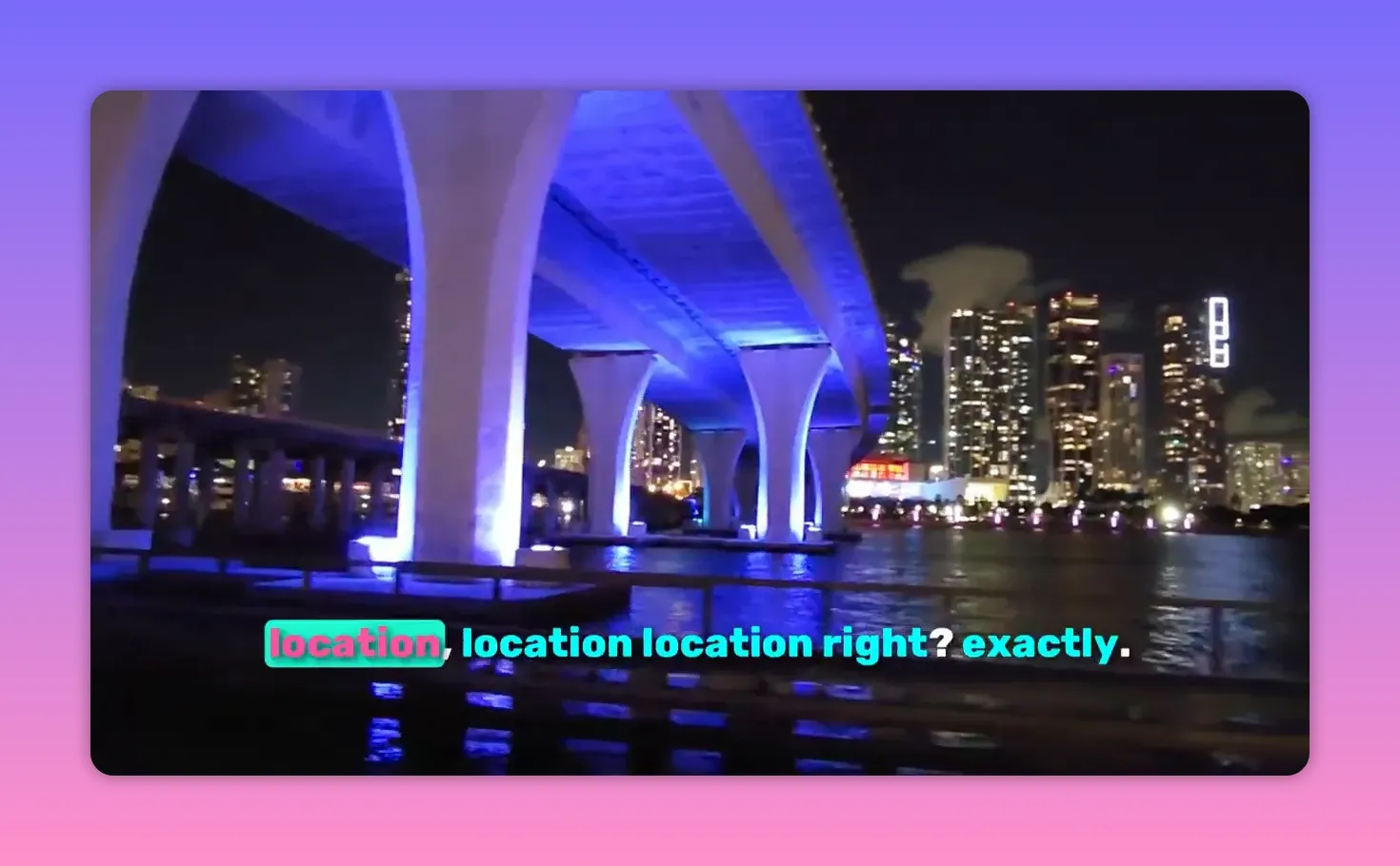Miami waterfront at night with illuminated architecture and city skyline