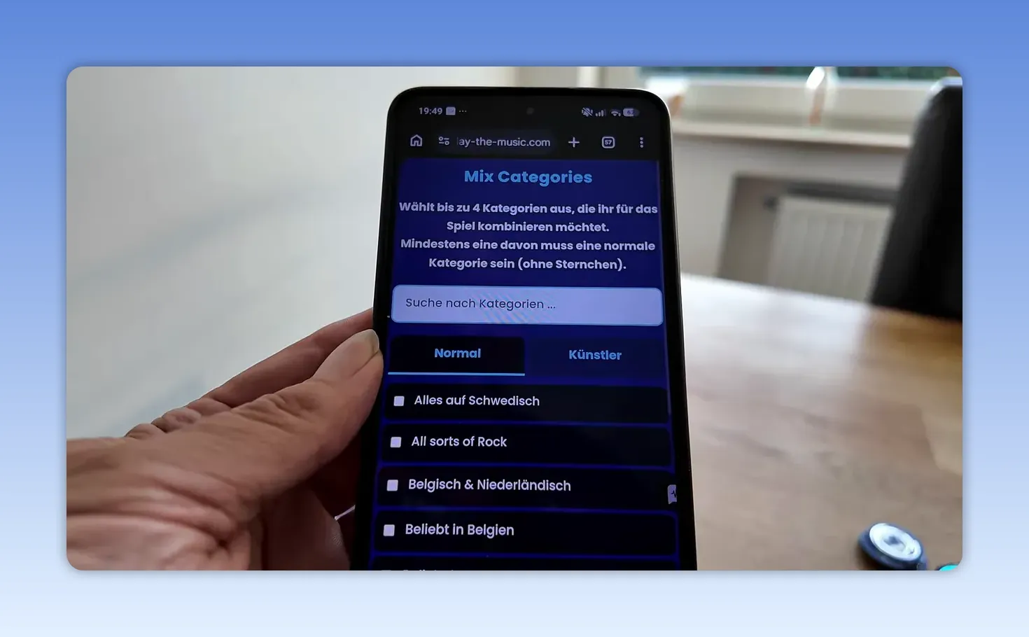 Smartphone mit Kategorienauswahl für Play the Music darunter Normal Alle Arten von Rock Englisch und Nordisch