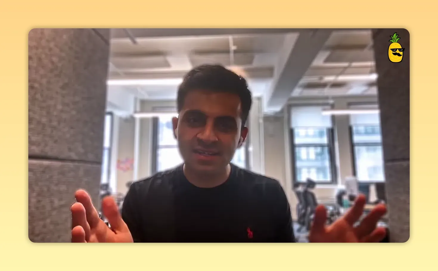 Founder using open hand gestures while explaining the one‑click mortgage vision in an office setting