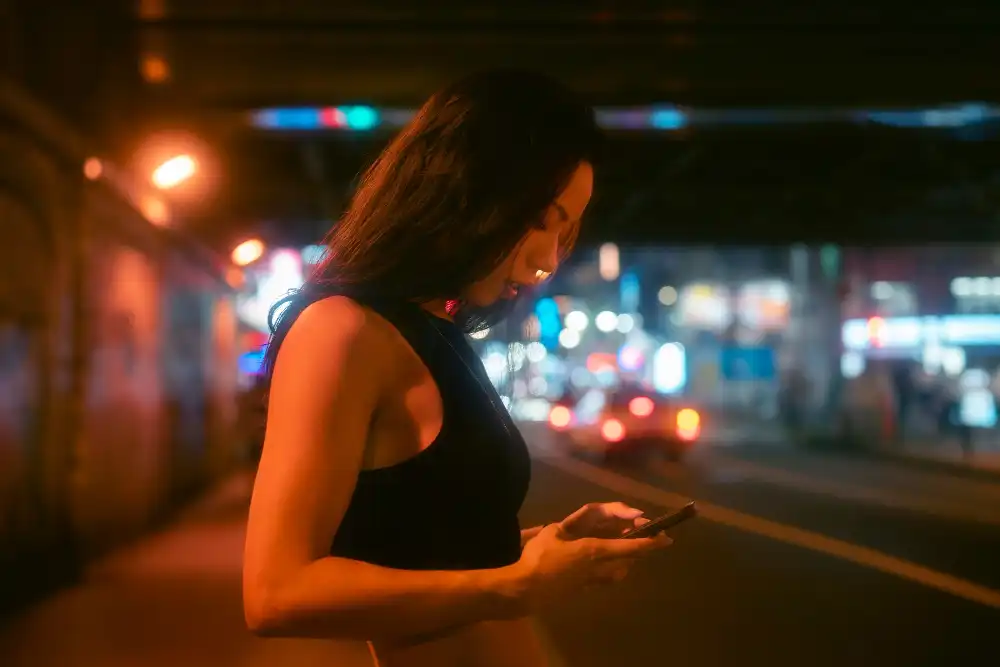 Lifestyle of night in the city with young woman