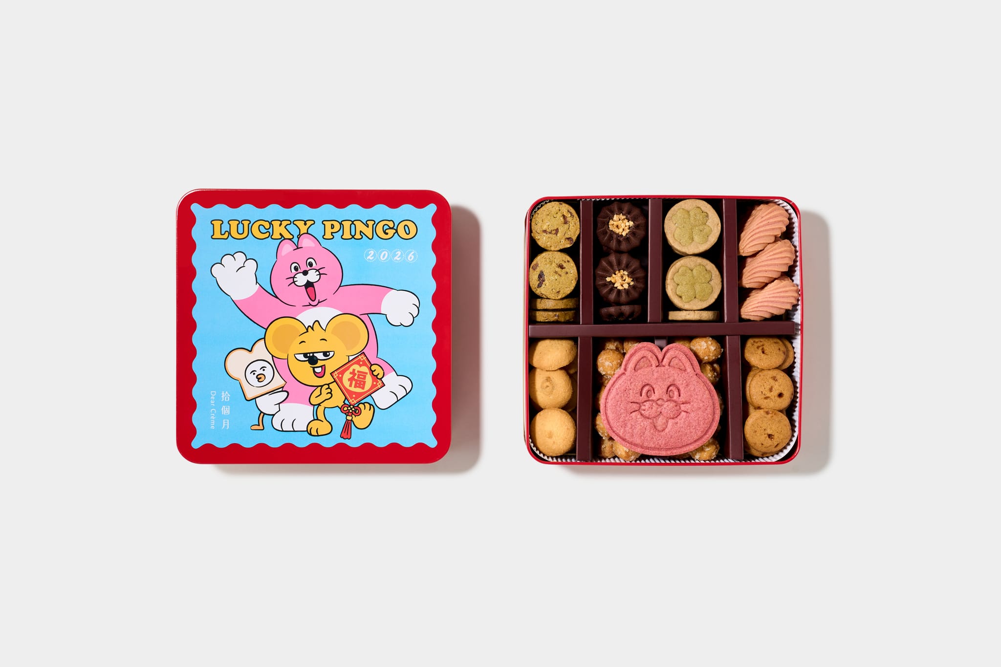 LUCKY PINGO聯名禮盒，左側印有ZIZONE圖案，右側打開呈現各式餅乾與PINGO造型餅乾。